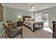 Bright bedroom with a queen-size bed and patio access at 4315 Cape Haze Dr, Placida, FL 33946