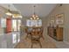 Formal dining area with oval table and six chairs at 4315 Cape Haze Dr, Placida, FL 33946