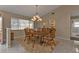 Elegant dining room featuring a wood table and chandelier at 4315 Cape Haze Dr, Placida, FL 33946