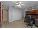 Home office features built-in desk, carpet, and double door closet at 4315 Cape Haze Dr, Placida, FL 33946