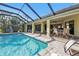 Screened pool and patio with outdoor furniture at 4315 Cape Haze Dr, Placida, FL 33946