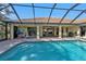 Relaxing pool and patio area with screened enclosure at 4315 Cape Haze Dr, Placida, FL 33946