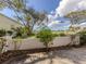 Landscaped yard with a view of a peaceful golf course at 437 Cerromar Ln # 312, Venice, FL 34293