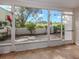 Bright screened patio overlooking a lush golf course view at 437 Cerromar Ln # 312, Venice, FL 34293