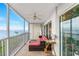 Relaxing screened balcony with water views and comfy seating at 101 N Marion Ct # 133, Punta Gorda, FL 33950