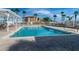 Inviting community pool with ample seating and a gazebo at 101 N Marion Ct # 133, Punta Gorda, FL 33950