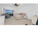 Main bedroom with water views and a ceiling fan at 101 N Marion Ct # 133, Punta Gorda, FL 33950