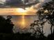 Scenic sunset view over the water, showcasing tranquil waterfront property at 101 N Marion Ct # 133, Punta Gorda, FL 33950