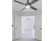 Bright, neutral bedroom featuring a ceiling fan at 12470 Wellen Golf St # 203, Venice, FL 34293