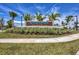 Well-manicured landscaping surrounds the Wellen Park Golf & Country Club entrance sign at 12470 Wellen Golf St # 203, Venice, FL 34293