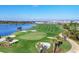 Beautifully landscaped golf course featuring rolling greens, sand traps, and a scenic water view at 12470 Wellen Golf St # 203, Venice, FL 34293