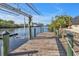 Private boat dock with lift and waterfront access at 13449 Palau Cir, Port Charlotte, FL 33953