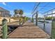 View from the dock toward the waterway at 13449 Palau Cir, Port Charlotte, FL 33953