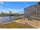 Enjoy waterfront views from this patio with steps to the dock at 13449 Palau Cir, Port Charlotte, FL 33953