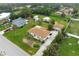 Single Gathering home with a large grassy yard and driveway at 1713 Belvidere Rd, Englewood, FL 34223