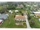 Aerial view showing a house and large backyard with detached shed at 1713 Belvidere Rd, Englewood, FL 34223