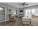 Living room with hardwood floors and sliding doors to balcony at 2061 Willow Hammock Cir # 204, Punta Gorda, FL 33983