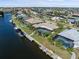 Aerial view of canal front home with private pool at 2199 El Cerito Ct, Punta Gorda, FL 33950