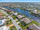 Aerial view of canal front home and landscape at 2199 El Cerito Ct, Punta Gorda, FL 33950