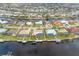 Aerial view of single Gathering home on canal at 2199 El Cerito Ct, Punta Gorda, FL 33950