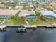 Aerial view of waterfront home with private dock at 2199 El Cerito Ct, Punta Gorda, FL 33950