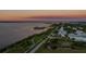 Scenic sunset aerial view of waterfront homes at 2199 El Cerito Ct, Punta Gorda, FL 33950