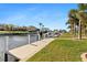 Private boat dock with lift, perfect for enjoying waterfront living at 2199 El Cerito Ct, Punta Gorda, FL 33950