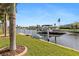 Convenient boat lift on private dock provides easy access to the water at 2199 El Cerito Ct, Punta Gorda, FL 33950