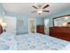 Comfortable main bedroom with a king-size bed and plenty of closet space at 2199 El Cerito Ct, Punta Gorda, FL 33950