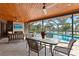 Relaxing screened pool area with outdoor kitchen and seating at 2199 El Cerito Ct, Punta Gorda, FL 33950