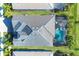 Aerial view showcasing home, pool, and backyard at 25223 Keygrass Ct, Punta Gorda, FL 33955