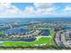 Wide aerial view of the community and surrounding golf course at 25223 Keygrass Ct, Punta Gorda, FL 33955