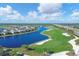 Expansive aerial view of community with waterways and golf course at 25223 Keygrass Ct, Punta Gorda, FL 33955