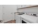 Convenient laundry room with washer, dryer and cabinets at 25223 Keygrass Ct, Punta Gorda, FL 33955