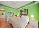 Bright bedroom with king-size bed and en-suite bathroom at 255 W End Dr # 2412, Punta Gorda, FL 33950