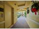 Elegant building hallway with access to elevator and courtyard at 255 W End Dr # 2412, Punta Gorda, FL 33950