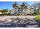 Attractive condo building with palm trees and ample parking at 255 W End Dr # 2412, Punta Gorda, FL 33950