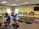 Fitness center with treadmills, exercise bikes, and strength training equipment at 255 W End Dr # 2412, Punta Gorda, FL 33950