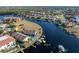 Aerial view of townhome and private dock with surrounding waterfront community at 3335 Purple Martin Dr # 1, Punta Gorda, FL 33950