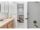 Clean bathroom with vanity, toilet and access to upstairs at 3335 Purple Martin Dr # 1, Punta Gorda, FL 33950