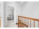 Upstairs hallway with view of bedroom and staircase at 3335 Purple Martin Dr # 1, Punta Gorda, FL 33950