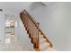 Wooden staircase with carpeted steps at 3335 Purple Martin Dr # 1, Punta Gorda, FL 33950