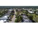 Aerial view of a residential neighborhood showcasing numerous homes and lush landscaping at 7529 Coral Tree, Punta Gorda, FL 33955