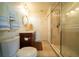 Bathroom with a shower, toilet, and a single vanity at 7529 Coral Tree, Punta Gorda, FL 33955