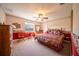 King-size bed, dresser, and views of the backyard from the window at 7529 Coral Tree, Punta Gorda, FL 33955