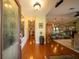 Bright entryway with hardwood floors and glass door at 7529 Coral Tree, Punta Gorda, FL 33955