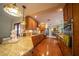 Kitchen boasts granite counters, wood cabinets, and stainless steel appliances at 7529 Coral Tree, Punta Gorda, FL 33955