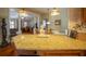 Kitchen island with granite countertop and decorative accents at 7529 Coral Tree, Punta Gorda, FL 33955