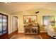 Living room with hardwood floors, large windows and comfortable seating at 7529 Coral Tree, Punta Gorda, FL 33955