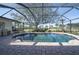 Relaxing screened-in pool area with brick pavers at 7529 Coral Tree, Punta Gorda, FL 33955